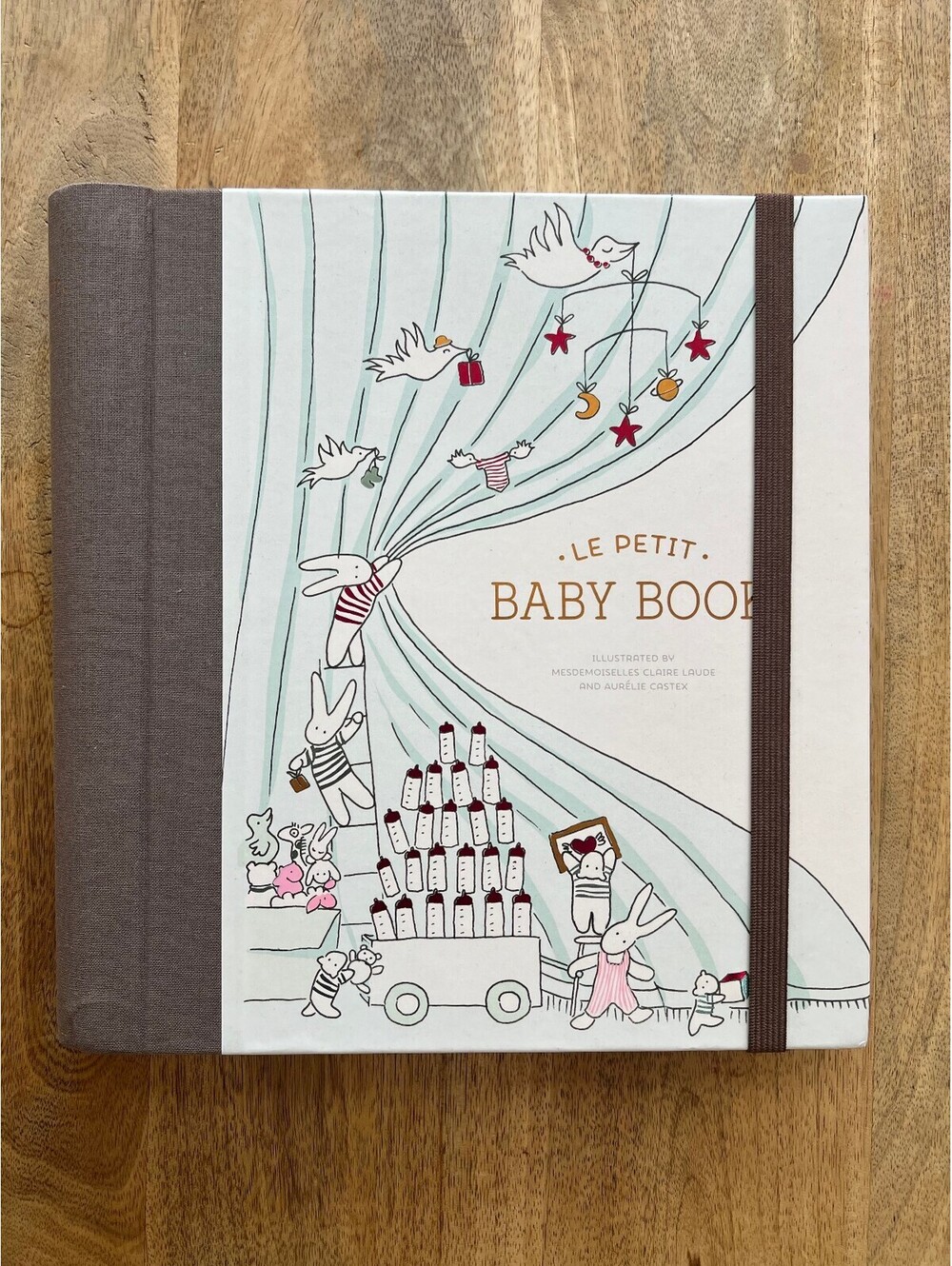 Le Petit Baby Book Keepsake Album with Illustrated Pop-Up and Milestone Pages